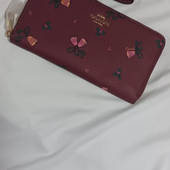 Coach Burgundy Wristlet with Floral Accents - Picture 2 of 7